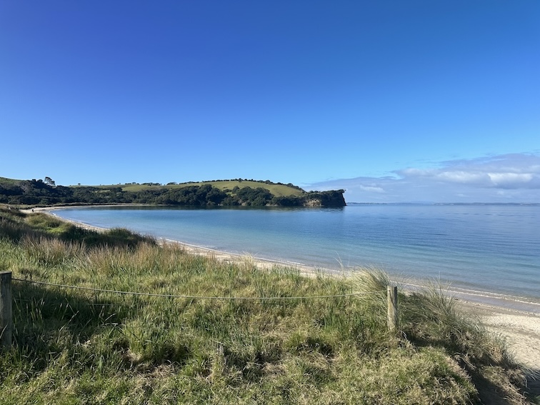 Picture of beach with peninsula in the back